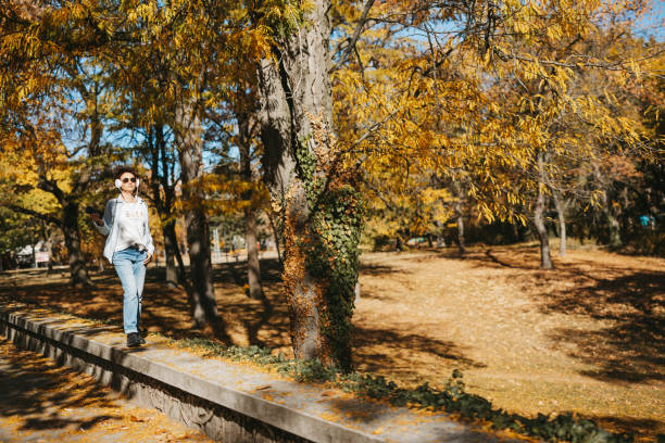 istock Enjoying music while walking in nature 1701964287