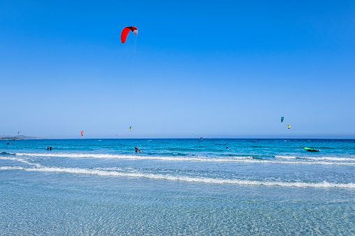 View on the beach Sotavento with golden sand and crystal sea water of amazing colors on Costa Calma on the Canary Island Fuerteventura, Spain. Beach Playa de Sotavento, Canary Island, Fuerteventura.