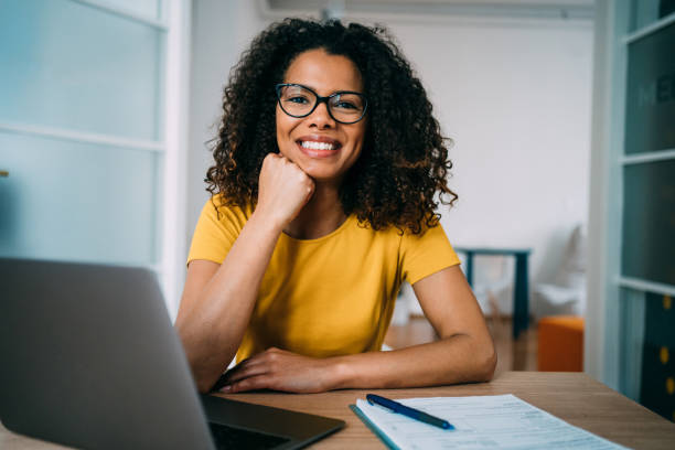 istock Confident businesswoman in modern office. 1701982078