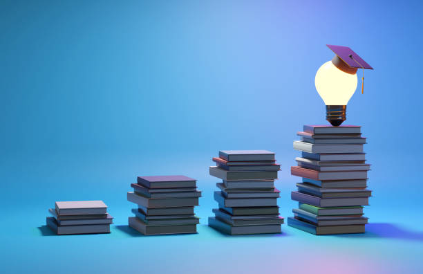 istock Light bulb education concept, graduation cap, books, and graduation scroll. Congratulations graduates 1701984293
