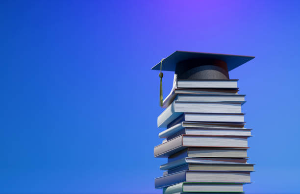 istock Education concept, graduation cap, books, and graduation scroll. Congratulations graduates 1701984298
