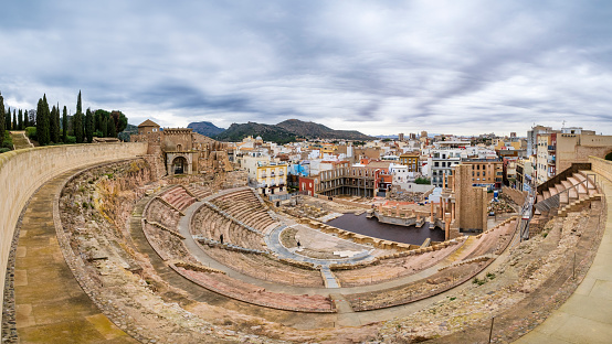 The Roman theatre, dating back from the first century A.D., and the nearby Old Cathedral, dating back to 13th century, are the historic landmarks of Cartagena, a city on the Mediterranean coast in the Murcia region (6 shots stitched)