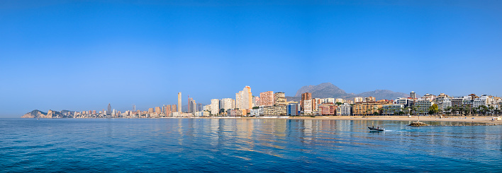 Skyscrapers lined up on the seafront of Benidorm, a very popular tourist destination on the Costa Blanca (7 shots stitched)