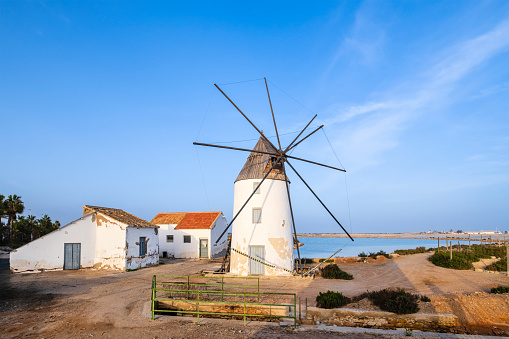 The Quintín windmill is one of the typical features in the Parque Regional de las Salinas of San Pedro del Pinatar, a small town in the Region of Murcia