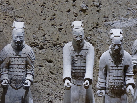 Xi'an, China – February 12, 2023: Shots of the Terracotta Warriors, depicting the armies of Qin Shi Huang, the first emperor of China. The figures stand within pits located at the Emperor Qinshihuang's Mausoleum Site Museum