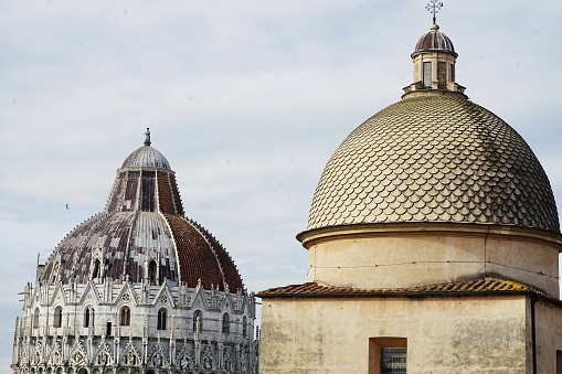 Domes of the baptistery and monumental cemetery in Pisa, Tuscany, Italy