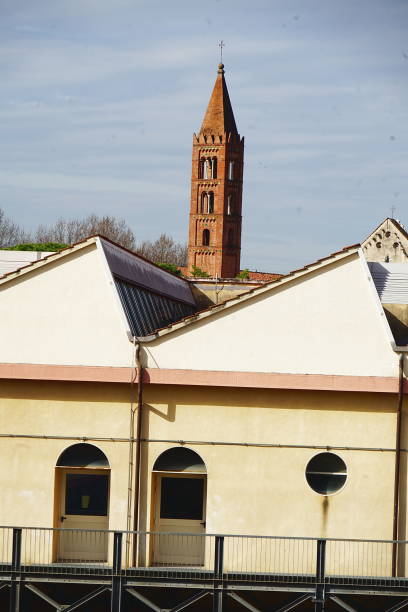 istock Factory seen from the ancient walls of Pisa 1702012160