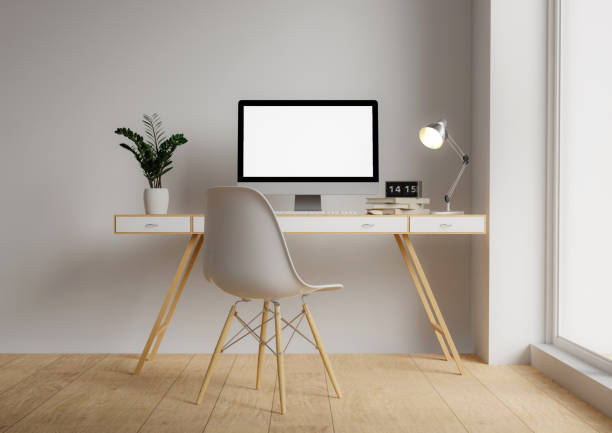 istock A modern PC computer blank screen mockup is on a table in a modern minimal home office. 3d render illustration 1702015533