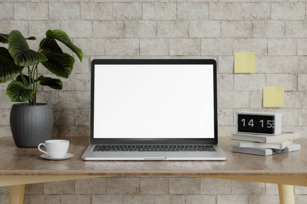 Minimalist workspace with a laptop mockup on a table in a minimal office. 3d render illustration