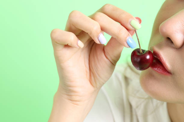 istock Woman with Fruit 1702044556