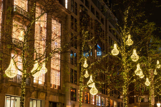 istock Amsterdam Dam square Christmas decorations in the trees 1702048917