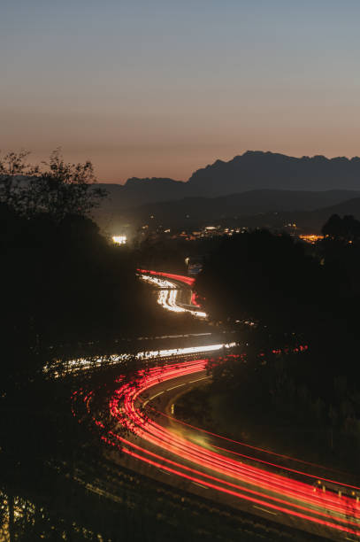 istock Highway with curves at dusk 1702051746
