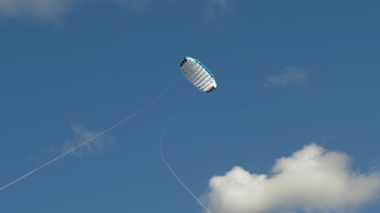 Flying a Kite on Sandy Sea Beach POV