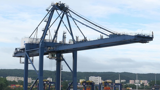 Passing by Gantry Cranes in Container Terminal