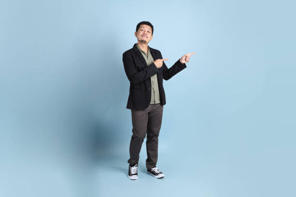 istock Asian Businessman Isolated 1702058370