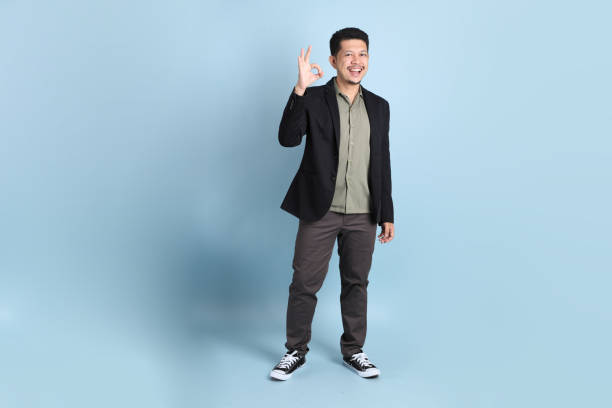 istock Asian Businessman Isolated 1702058411