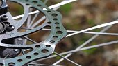 Bicycle Wheel Brake Disc and Spokes Rotating Slow Motion