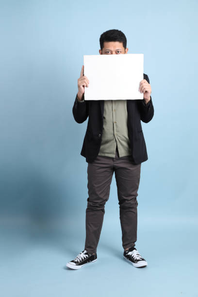 istock Asian Businessman Isolated 1702058489