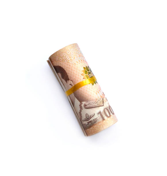 istock Thai banknote and cash isolated on white background 1702061819