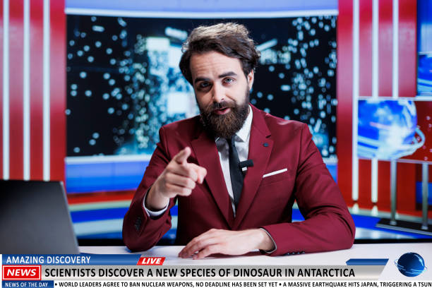 News anchor talks about rare discovery on live television program, scientists discovered a new dinosaurus species in antarctica. Journalist discussing about bizarre revelation.