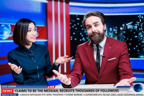 istock News team discuss about cult leader 1702075168