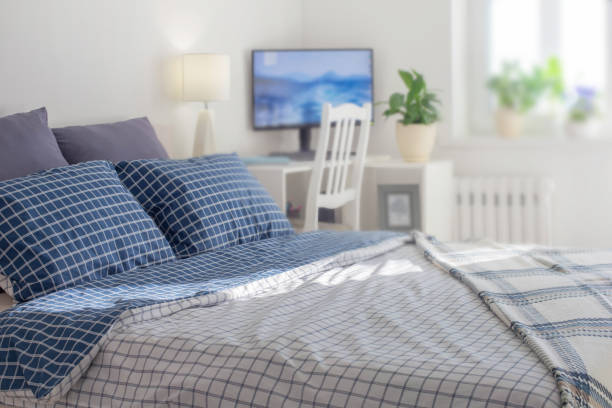 istock bedroom in white and blue colors 1702084767