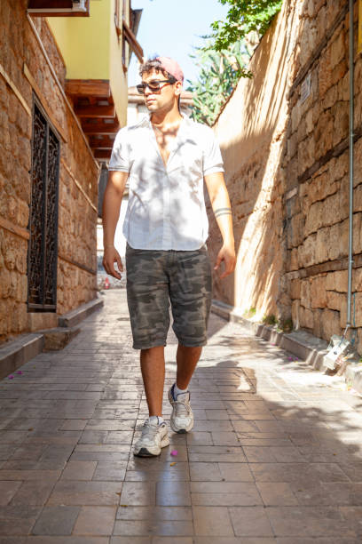 istock Portrait of young men walking 1702088285