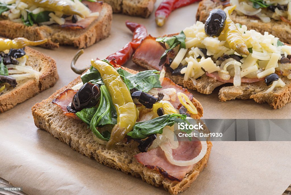 tasty appetizer of cheese and chives on sliced bread Appetizer Stock Photo