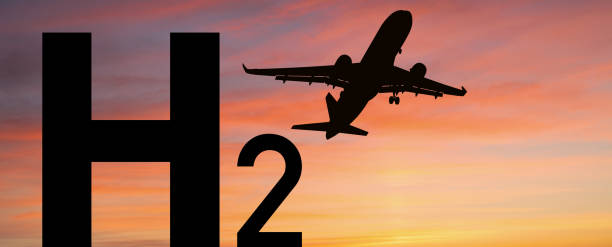 istock Silhouette of landing plane with H2 hydrogen symbol. 1702120823