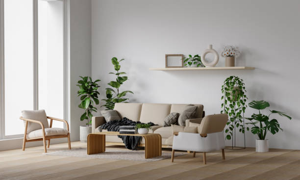 istock Modern minimalist interior with an armchair on empty cream color wall background.3D rendering 1702128482