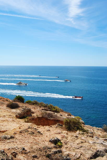 istock Boat race on the horizon 1702144968