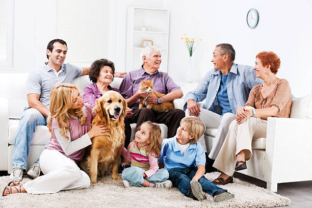 Extended family enjoying at home with their pets.