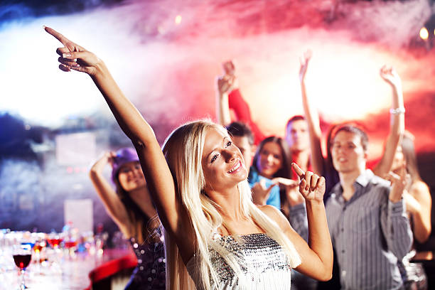 istock Young blonde dancing at the disco club. 170214895