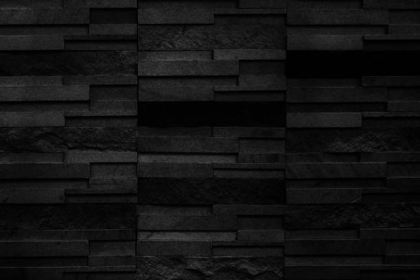 istock Dark grey black slate texture in natural pattern with high resolution for background and design art work. Black stone wall. 1702175575