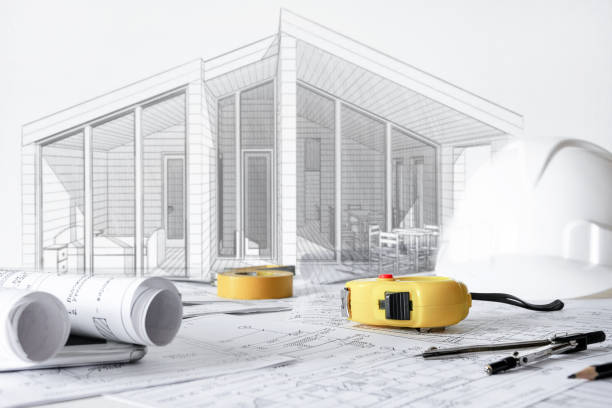 istock Architects concept,eco project house,Retrofit movement,engineer architect designer working drawing sketch plans blueprints and making construction eco model 1702188424