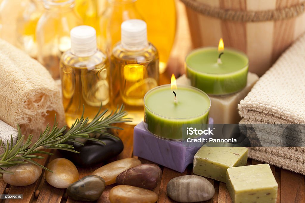 Spa concept with orchid Spa concept with candle, orchid, massage oil Candle Stock Photo