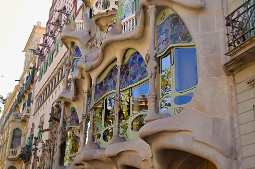 Barcelona, Spain: 09/25/2023- Low angle view of Casa Batllo building of Antoni Gaudi in Barcelona, Spain.