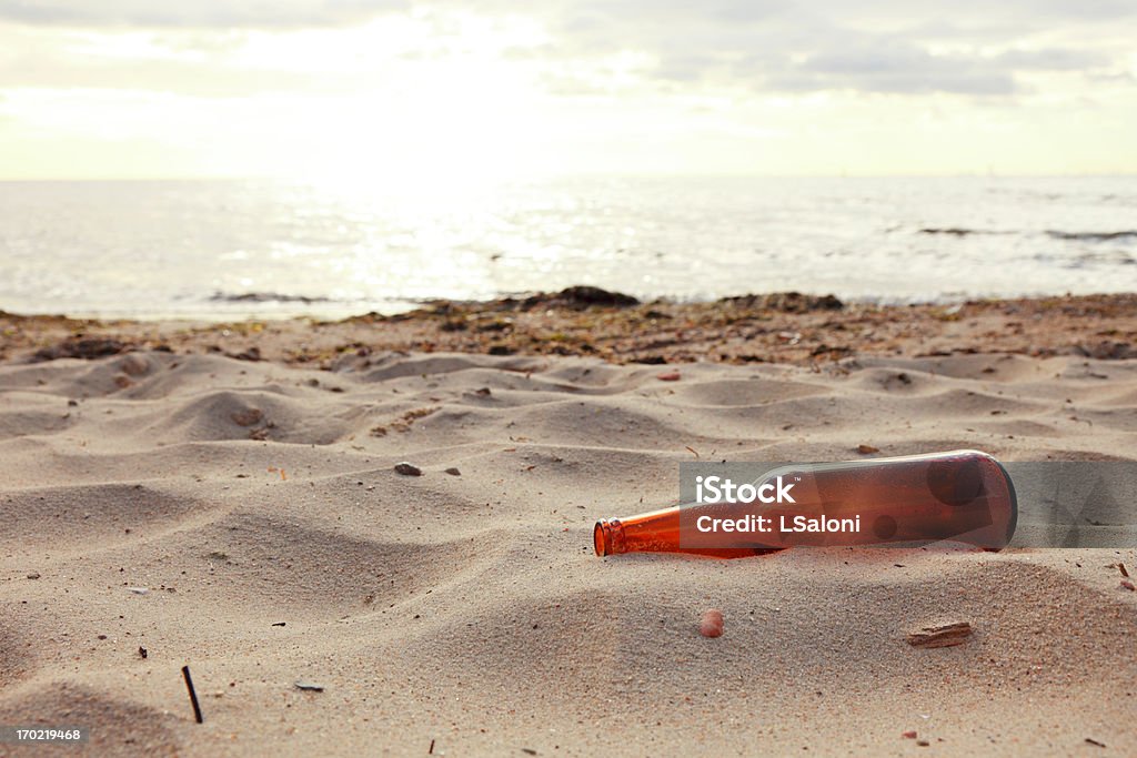 bottle on beach bottle on beach sea and sky Beach Stock Photo