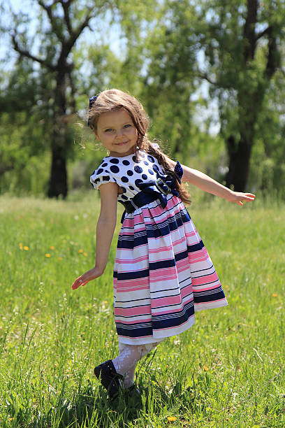 istock Little girl  on grass. 170219978