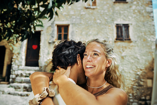 Happy Couple Uncover Hidden Gems in Quaint French Villages, Enjoying Discovering its Charms.