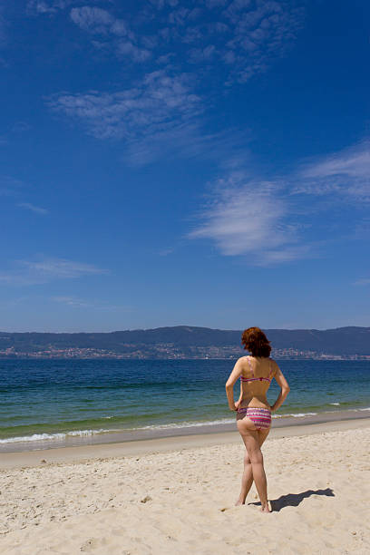 istock Woman looking at the sea 170222198
