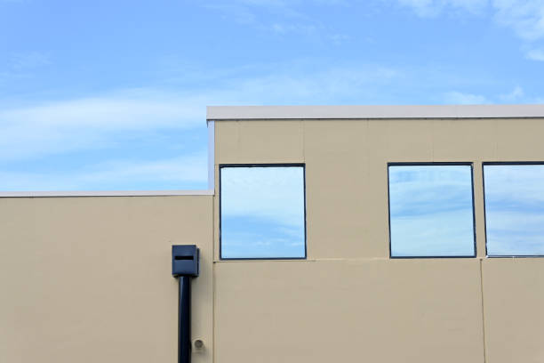 istock Windows with a reflection of the sky 1702226045
