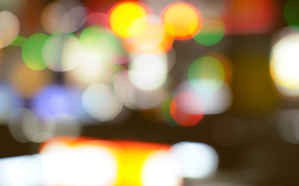istock Blurred bokeh background. Abstract and blurry lights create a festive atmosphere with bright, colorful bokeh background. Vibrant Christmas celebration. Holiday wallpaper for a festive holiday season. 1702246100