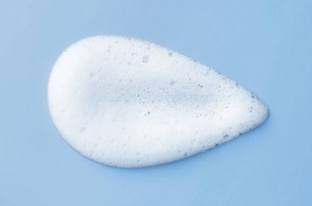 istock White skincare cleansing foam on light blue background 1702298706