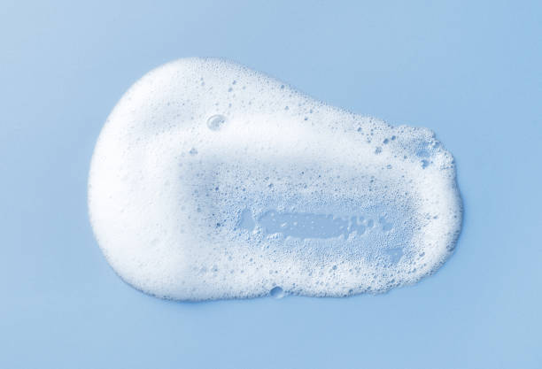 istock White skincare cleansing foam on light blue background 1702299292
