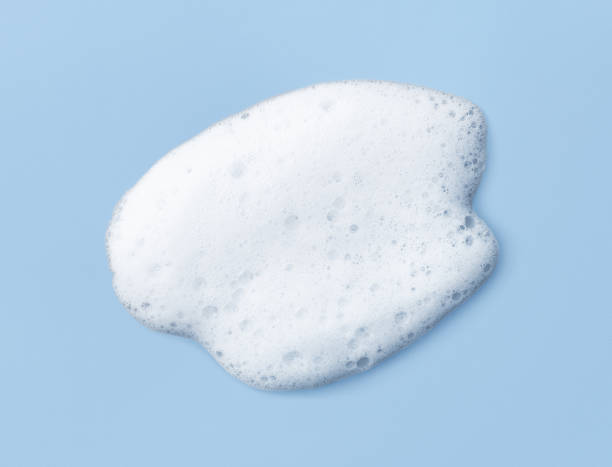istock White skincare cleansing foam on light blue background 1702299302