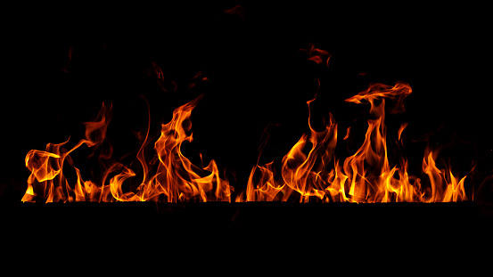 Red And Yellow Flames Burning In The Dark - Abstract Defocused Background