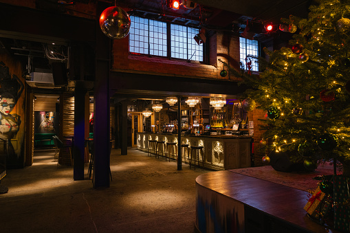 A wide angle view of an empty nightclub at Christmas in Newcastle upon Tyne in the North East of England. The club is dressed for Christmas and New year.