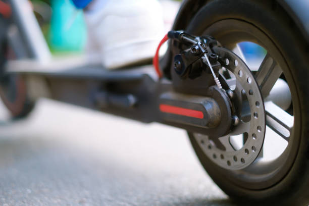istock Electric scooter on a road 1702330259