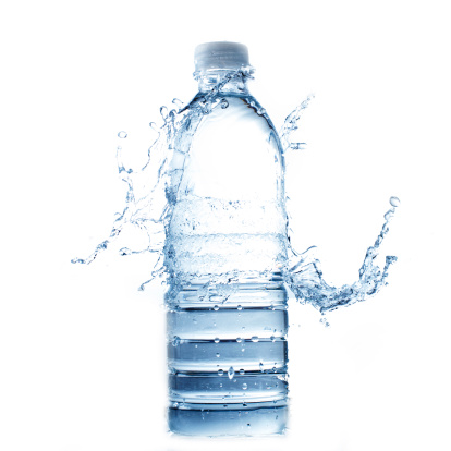 Water splash to drinking bottle on white background